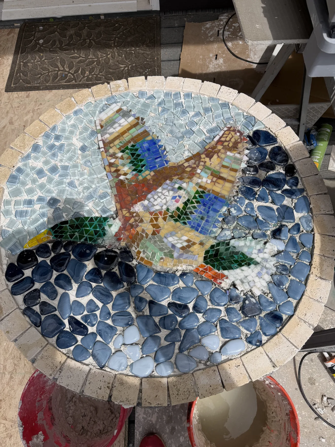 Round mosaic tabletop with a pair of mallard ducks, hand-cut glass and stone